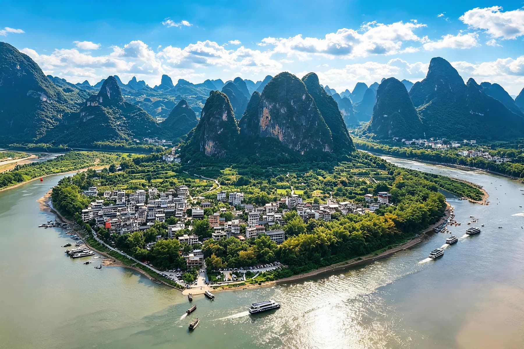 Karst mountains and a river curving around a village near Guilin