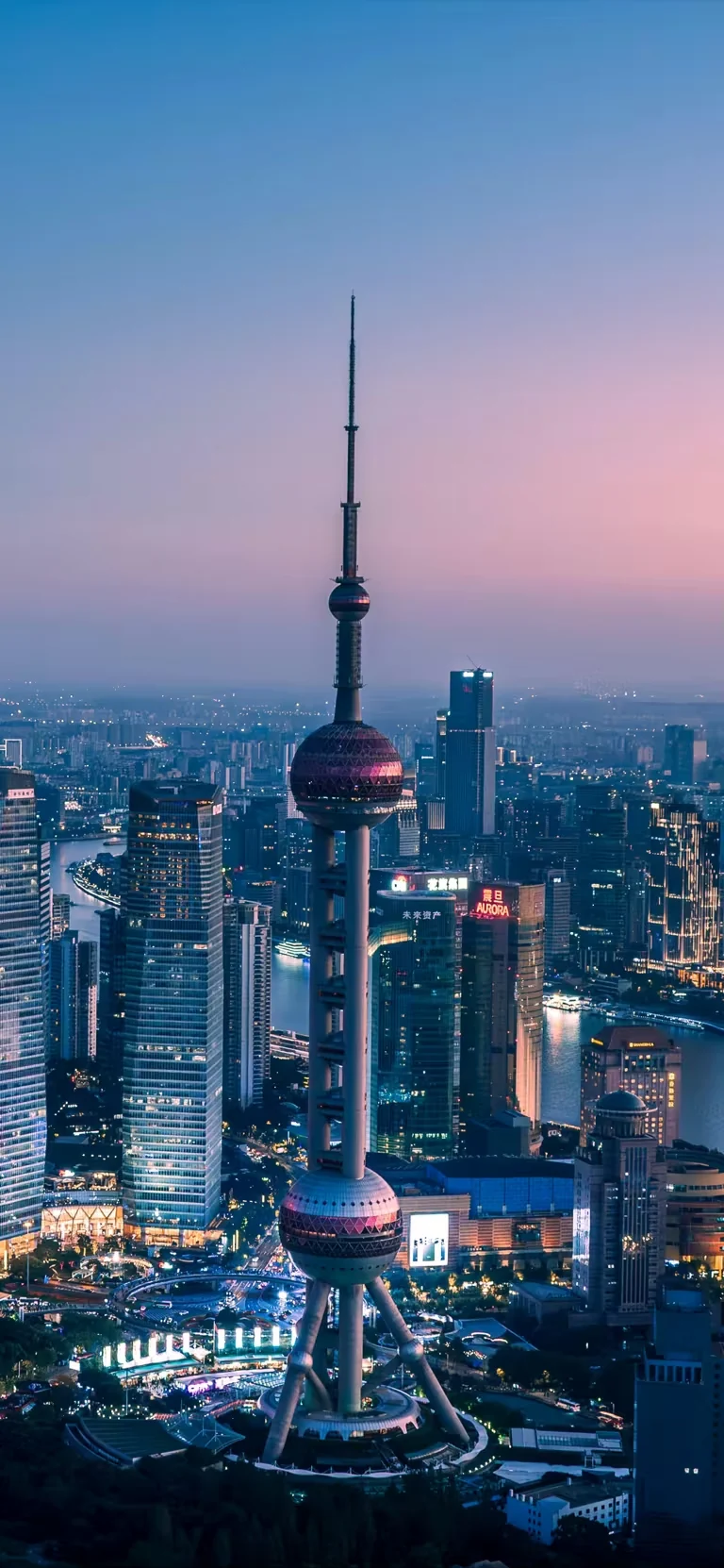 Shanghai's Lujiazui skyline and the Oriental Pearl Tower at blue hour